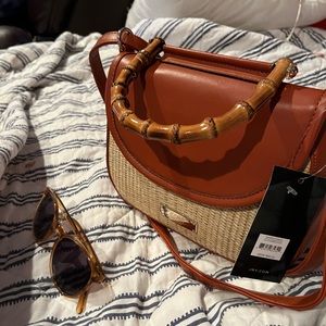 Jones New York brown and ratton, nwt.summer purse schedule so Cute